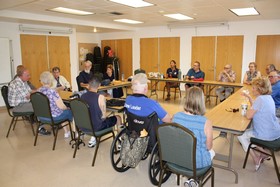 Survivors Support Group members chat in a safe environment